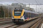 Grau ist 19 November 2023 wann NS 2783 in Nijmegen eintreft. Das Bild wurde vom Bahnsteig gemacht.