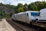 Die an die TX Logistik AG, Troisdorf  (zur Mercitalia Group gehörend) vermietete SIEMENS Vectron AC 193 997-4 „Wir bringen die Kraft von 8.500 Pferden auf die Schiene“ (91 80 6193 997-4 D-Rpool) fährt am 15 September 2024, mit der kalten TXL 185 417-5 (91 81 0185 417-5 A-TXLA) der TX Logistik Austria GmbH und einem langen mit FIAT-Nutzfahrzeuge beladenen Flachwagenzug (2 x 2 achsige Flachwageneinheiten), durch den Bahnhof Kirchen (Sieg) in Richtung Köln. 

Die Wechselstromlok (AC 15 kV 16,7 Hz und AC 25 kV 50 Hz) SIEMENS Vectron AC 193 997-4 wurde 2019 von Siemens Mobilitiy in München-Allach unter der Fabriknummer 22696. Sie ist als Vectron AC B16-2b ausgeführt und hat so die Zulassung für Deutschland, Österreich, Ungarn und Rumänien (D / A / H + RO). Da sie eine Leistung von 6.400 kW besitzt, was 8.700 PS entspricht, so müsste es eigentlich heißen „8.700 Pferde“. 

Die „kalte“ Bombardier TRAXX F140 AC2 wurde 2013 von Bombardier in Kassel unter der Fabriknummer 34993 gebaut und an die TXL - TX Logistik Austria GmbH geliefert. Sie hat die Zulassung für Deutschland, Österreich, Dänemark und Schweden (D / A / DK und S).
