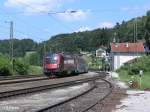 1116 215 schiebt den RJ67 Budapest Keleti pu.