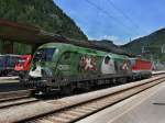 Die 1116 264 (Euromotion) und die 1144 235 am 11.06.2009 im Bahnhof Brenner.