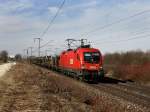 Die 1116 168 am 12.03.2011 mit einem Leeren Autozug unterwegs bei Obertraubling.