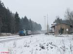 277 005 und 182 523 mit einem Containerzug aus Wiesau nach Hof und dann weiter nach Hamburg bei der druchfahrt in Roßlau.