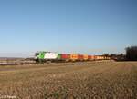 ER20 03 zieht bei Oberteich mit dem Containerzug nach Hamburg.