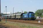 SM42-1097 mit ex-KPEV-Wagen in Wolsztyn am 30 April 2011.