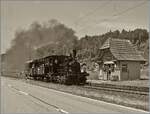  Gestern und heute : Mit einem Dampfzug der  Emmentalbahn  auf der Fahrt nach Wasen i. E. erreicht die E 3/3 853 (UIC 90 85 0008 573-3) den Halt Oberei. 

14. Juni 2025