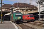 SBB Re 460 087-0 mit ihre IR nach Brig und Die SBB Re 460 037-5 mit ihrem IC nach St.Gallen in Lausanne.