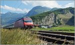 Die SBB Re 460 017-7 mit einem IR nach Brig kurz nach Aigle.