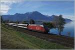 Eine SBB Re 460 mit ihrem IR auf dem Weg nach Genève bei Villeneuve.