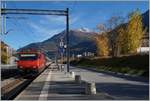 Die SBB Re 460 079-7 trifft mit einem IR von Brig nach Genève Aéroport in Leuk ein.