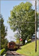 Die BOB HGe 3/3 29 auf der Fahrt nach Chaulin beim Einfahrtsignal von Blonay .