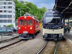 Alt und neu in Vevey: Links der RhB ABe 4/4 35 der Blonay Chamby Bahn und rechts der CEV MVR ABeh 2/6 7502, der gerade von Les Pleiades in Vevey angekommen ist.