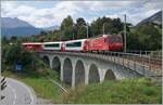 Eine MGB HGe 4/4 mit ihrem Glaciere Express bei Sedrun.