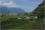 Das Trasse der ASD führt in grossen Schleifen durch die Weinberge von Aigle um die nötige Höhe zu gewinnen; im Bild der neune TPC ASD ABe 4/8 471 als R71 auf der Fahrt nach Les