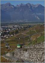 Mit dem TPC A-L Bt an der Spitze und dem schiebenden TPC A-L BDeh 4/4 310 erklimmt der R 70 336 die Steigung vom Tal hinauf in Richtung Leysin Grand-Hôtel.