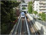 Ein TL Be 8/8 der Linie M2 im Testbetrieb zwischen dem Bahnhof (oben zu erkennen) und Ouchy.