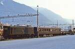 Ae 3/5 10219 vor einem Autozug durch den Simplontunnel in Brig (Mai 1980)