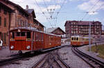 Two different Jungfraubahn (JB) trains at Kleine Scheidegg on 3rd Septeber 1962.