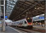 Seit dem Fahrplanwechsel im Dez. 2023 verkehren im Raum Lausanne keine S-Bahnen mehr, sondern Regionalzüge. Im Bild der SBB RABe 523 014 als R3 nach Aigle beim Halt in Lausanne. 

1. Jan. 2023