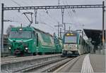 Die beiden BAM MBC (ab 1.1.2027 Movodis SA) Ge 4/4 22 und 21 stehen mit einem Kieszug in Morges, daneben der BAM MBC (ab 1.1.2027 Movodis SA) SURF Be 4/4 Pendelzug nach Bi�re.

4. M�rz 2024.

4. M�rz 2024