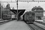 RM/VHB: Zusammentreffen von drei Zügen in Ramsei nach Huttwil, Langnau i.E. und Burgdorf im Jahre 1989. ((BDe 4/4 l (solo), RBDe (566 228-242) sowie BDe 4/4 l (mit ABt).
Foto: Walter Ruetsch 