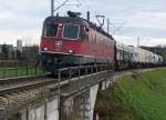 SBB/BLS: Güterzug Wiler bei Utzenstorf-Zürich RBL mit Re 6/6 11644  CORNAUX  bei Biberist am 12.