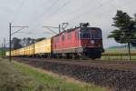 SBB: Re 4/4 11270 mit einem Postzug bei Niederbipp am 15.