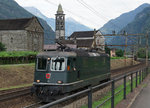 SBB HISTORIC: 
 Schweiz aktuell am Gotthard  - Dampfzug mit der C 5/6 2978 vom 28. Juli 2016.
Die grüne Re 4/4 11161 leistete dem Dampfzug 30052 auf der Rückfahrt ab Biasca bis Bodio und ab Airolo bis Göschenen Vorspann anschliessend als Lokzug bis Erstfeld. Lokzug auf der Rückfahrt bei Giornico vor der prächtigen Kulisse der Kirche San Michele am 28. Juli 2016. 
Foto: Walter Ruetsch
