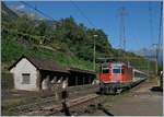 Die SBB Re 4/4 II mit einem ETR 610 Ersatz Zug, welcher systembedingt nur bis Chiasso stattt Milano verkehren wird bei der Durchfahrt in Giornico.