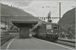 Die SBB Re  4/4 II 11158 mit einen  Gotthard -IR Richtung Norden beim Halt in Faido.