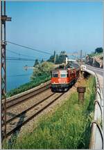 Die SBB Re 4/4 II 11259 ist mit dem EC 39  Monteverdi  von Genève nach Venezia kurz vor Vevey unterwegs.