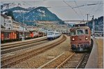 BLS Autoverlad Göschenen - Airolo. Lange Jahre, bis zu Eröffnung des Gotthard Strassentunnels 1981 betrieben die SBB einen Autoverlad durch den Gotthardtunnel. Als dann im Herbst 2001 nach einem Unfall den Strassentunnel für gut zwei Monate gesperrt werden musste, zog die BLS einen Autoverlad auf. 
BLS Re 4/4 178 mit ihrem Autozug Airolo - Göschenen und ein Durchfahrender CIS ETR 470 in Airolo 
Analogbilder vom 16. bzw. 21. November 2001 