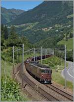 BLS Re 4/4 166 - 173, ab 1970; die BLS Re 4/4 170  Brig-Glis  und eine weitere sind mit einem Güterzug auf der Gotthard Südrampe Rodi-Fiesso unterwegs. 

24. Juni 2015