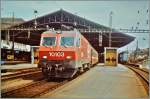 re-44-iv-re-446/379581/die-sbb-re-44-iv-10103 Die SBB Re 4/4 IV 10103 mit dem internationlen Schnellzug 322 von Milano nach Genève in Lausanne am 24. Mai 1985.