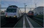 Der IR 1706 Brig - Genève Aéroport mit der SBB Re 460 086-2  TGV Lyria  wird von IR 1906 Sion Genève-Aéroprt mit der Re 4/4 II 11154 in Morges überholt.