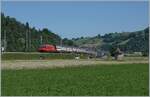 Eine SBB Re 460 mit einem IC von Romanshorn nach Brig zwischen Mülenen und Reichenbach im Kandertal.