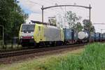 SBBCI 189 993 schleppt ein KLV durch Hulten am feuchten Morgen von 7 Juli 2021.