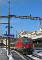 SBB Re 4/4 II 11138 mit einem (noch) grnen EW IV in Lausanne.