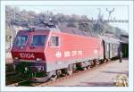 SBB Re 4/4 IV 10104 mit einem Schnellzug nach Lausanne in Vevey im Sommer 1985.