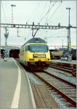 Die erste  Western Union  Werbelok Re 460 114-2 in Zrich HB.