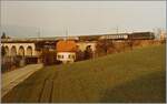 Die SBB Re 6/6 11643  Laufen  mit dem IC 378  Mont-Blanc  Hamburg - Genève mit Kurswagen nach Port-Bou auf dem 285 langen Mösli-Viadukt in Grenchen.

Analogbild vom 20. April 1984