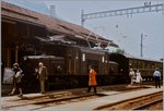 Bahnhofszene in Filisur mir der Ge 6/6 I 412, einigen Reiseden, Zug- und Stationspersonal. 
20. August 1984