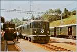 RhB Ge 6/6 I 412 mit ihrem Güterzug wartet in Filisur an der Rampe, währen die Ge 4/4 II 617 mit ihrem Albula-Schnellzug nach St. Moritz eintrifft, im Hintergrund der Anschlusszug von und nach Davos. 


20. August 1984 

