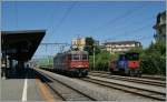 SBB Cargo in Rennes VD: Re 620 088-5 und ein Tm 232.