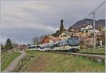 Die MOB Ge 4/4 8001 mit dem IR 2115 auf der Fahrt nach Montreux bei Planchamp, wo wie links im Bild zu sehen ist, bedeuten gerodet wurde, was dem Blick auf länger Züge zugute kommt, auch