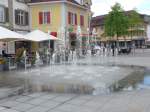 (151'062) - Springbrunnen in Del�mont am 29.