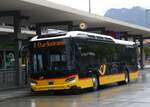 (267'855) - Dnser, Trimmis - GR 95'517/PID 11'896 - eScania (ex GR 184'921) am 8. Oktober 2024 beim Bahnhof Chur