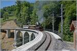 Die SEG G 2x2/2 105 der Blonay Chamby Bahn mit ihrem Dampfzug auf dem Weg von Blonay nach Chamby und fährt über den nun frisch sanierten Baye de Clarens Viaduktes. Der westliche Teil des Viaduktes wurde neu erstellt und wird in Zukunft den ständigen Bergdruck (bzw. Bewegung) Richtung Baye de Clarens Schlucht aufnehmen können. 

18. Mai 2025 