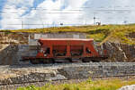 Der vierachsige Selbstentladewagen /Schwerkraftentladewagen Fac 8708, ex Fad 8708, am 06.09.2021 abgestellt in Ospizio Bernina.