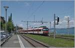 Mit dem schiebenden RBDe 560 403 (RBDe 560 DO RA 94 85 7 560 403-8 CH-RA) erreicht als R 91 auf der Fahrt von St-Gingolph nach Brig den Bahnhof von Bouveret. 

24. Juli 2024