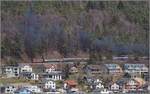 IGE-Abschiedsfahrt vom  Blauen Fernschnellzug . 

Oberhalb von Sanceboz-Sombeval schiebt Re 4/4 I 10009 den Zug Richtung Col Pierre Pertuis nach. März 2019.